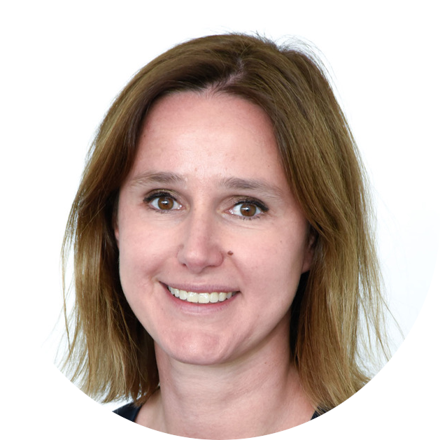 Smiling woman with shoulder-length light brown hair in a circular portrait on a white background.